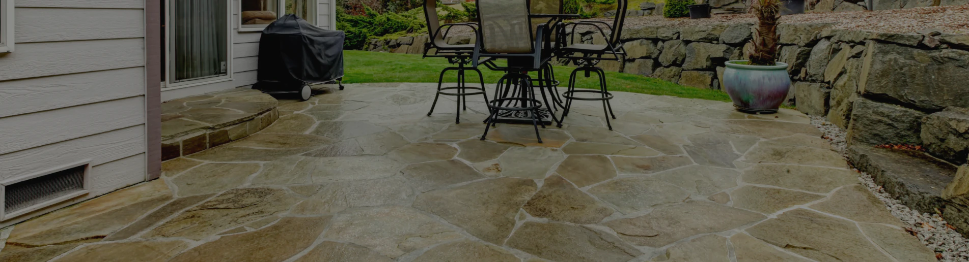 close up shot of backyard patio with decorative concrete