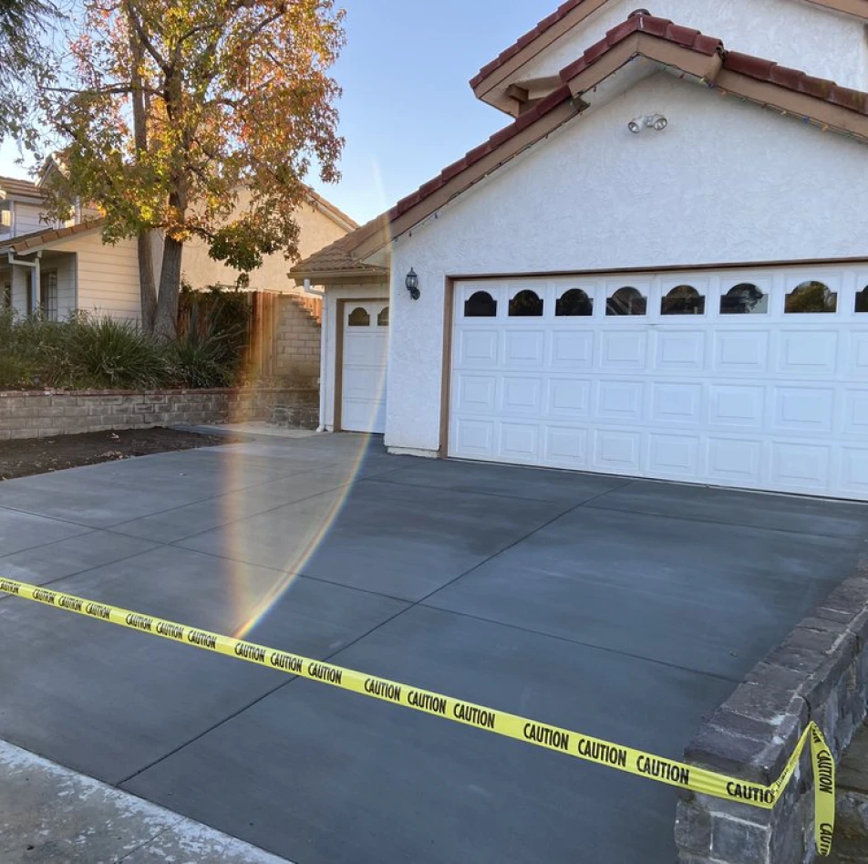residential house with new concrete driveway